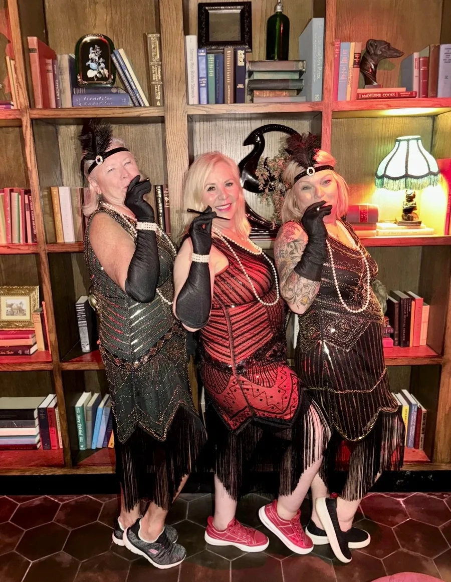 Telltale Tours guests dressed in 1920s flapper style at a NYC speakeasy
